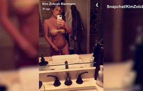 Kim Zolciak Puts Boobs On Display In A Bizarre See Through Bikini