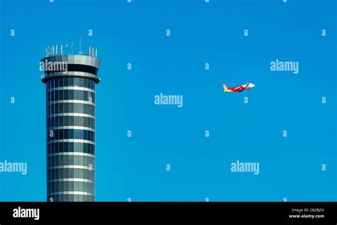 Air Traffic Control Tower In The Airport With International Flight