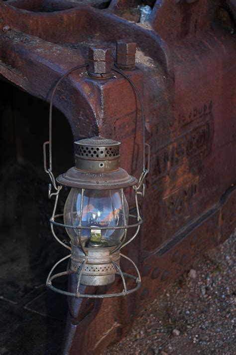 A Railroad Lantern Marked Cqb Or Copper Queen Branch Hanging On A