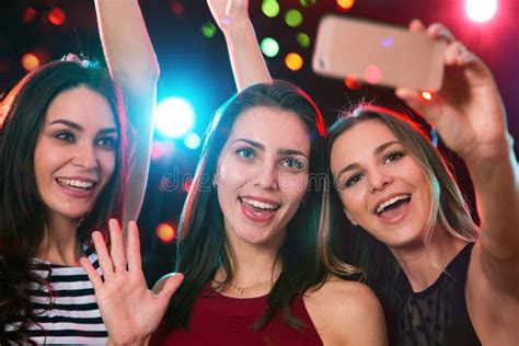 smiling girls taking selfie in a night club stock image image of dancer expressing 132622985
