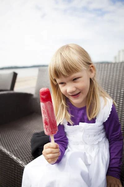 Girl Sucking Popsicle