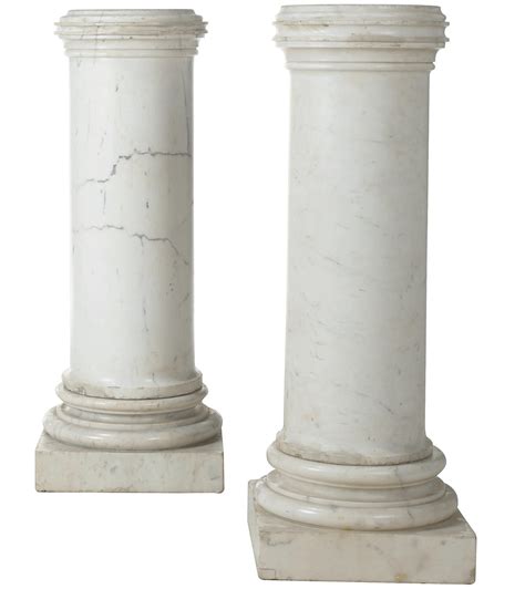 A Pair Of Veined White Marble Pedestal Columns