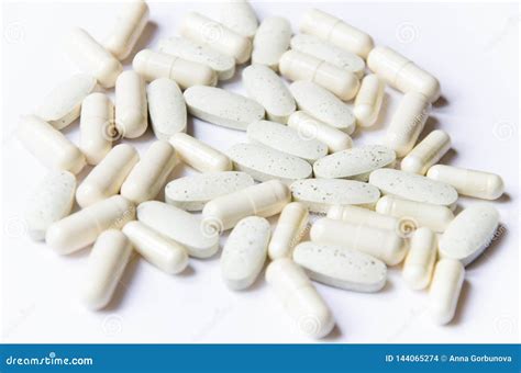 Vitamins Tablets And Capsules On A White Background Stock Photo Image