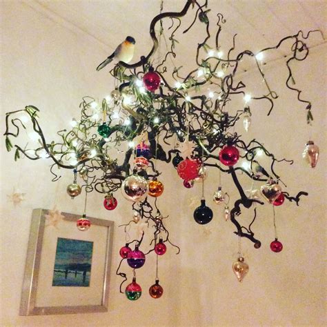 Christmas Ornaments Hanging On A Branch