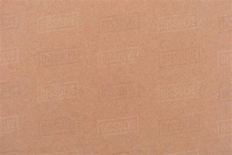 Texture Of Light Brown Color Paper As Background Stock Photo Dissolve