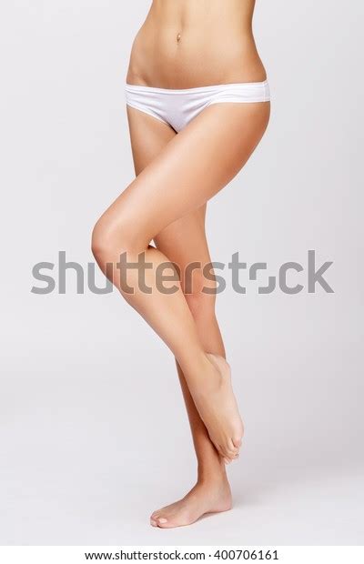 Slim Tanned Womans Body Over Gray Stock Photo 400706161 Shutterstock