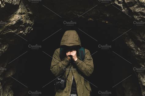 Person Standing In A Cave Entrance ~ People Images ~ Creative Market