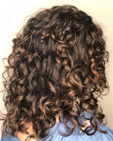 Medium length curly hairstyles for women. 26 Best Shoulder Length Curly Hair Cuts & Styles in 2021