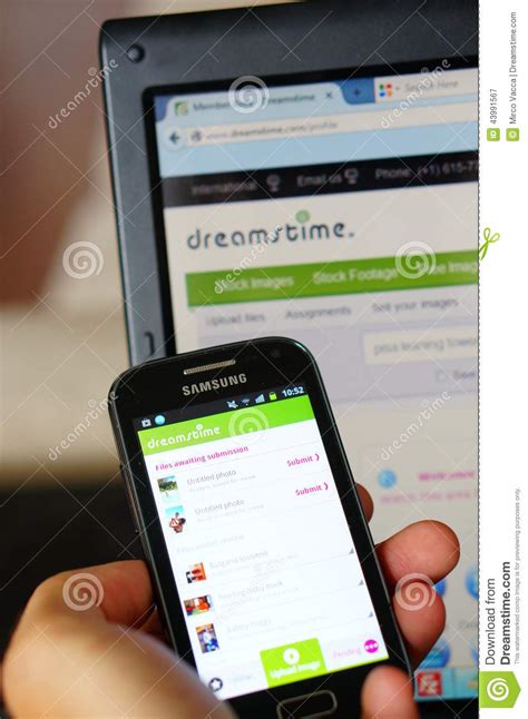 Dreamstime Mobile App With Dreamstime Logo Editorial Image