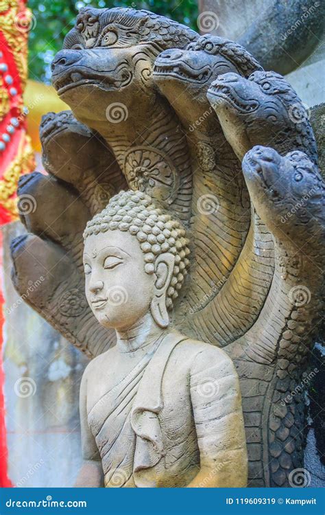 Beautiful Buddha Statue Made Of Sand Stone And Cover With Naga Heads