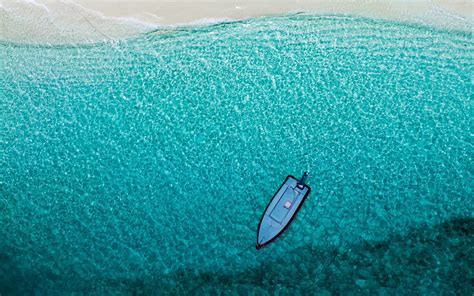 Download Wallpaper 1680x1050 Sea Beach Aerial View Boat Water