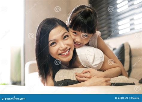 Asian Daughter Hugs Mother Stock Photo Image
