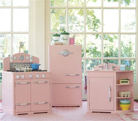 Ellie's kitchen is made all in pine with all the edges rounded with a router so she wouldn't get bumped. A retro pink kitchen at Pottery Barn… too bad it's for ...