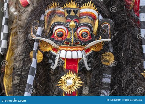 Traditional Balinese Barong Mask On Street Ceremony In Island Bali