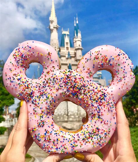 disney food blog on instagram “look who s here 🍩 this mickey donut is debuting today he comes