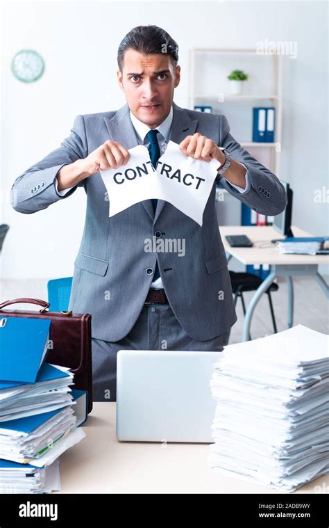 Businessman With Heavy Paperwork Workload Stock Photo Alamy