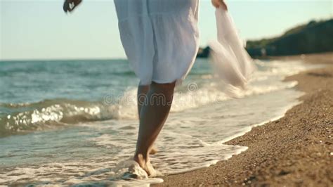 The Girl Runs Barefoot Along The Sea Coast Stock Footage Video Of Water Vacation 253077732