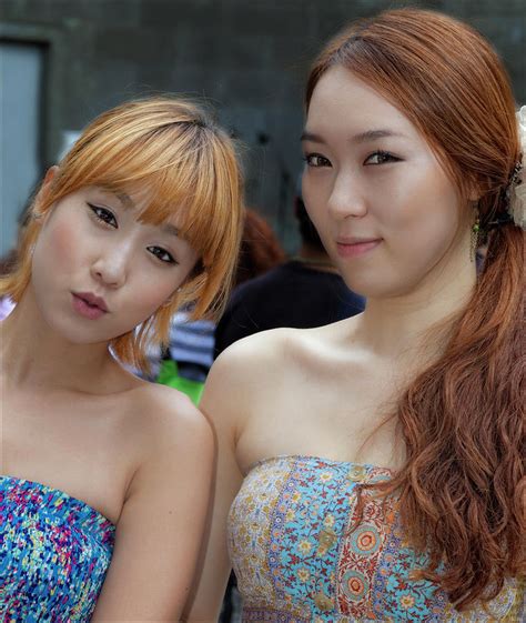 Two Young Korean Women Korea Day Nyc 2011 Photograph By Robert Ullmann