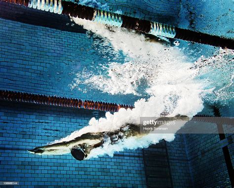 Female Swimmer Diving Into Pool Stock Photo Getty Images