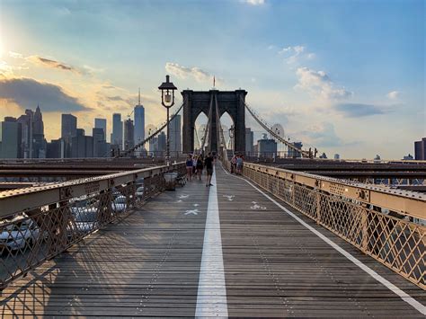 Walking Across Brooklyn Bridge In Nyc One World 2 Travelers