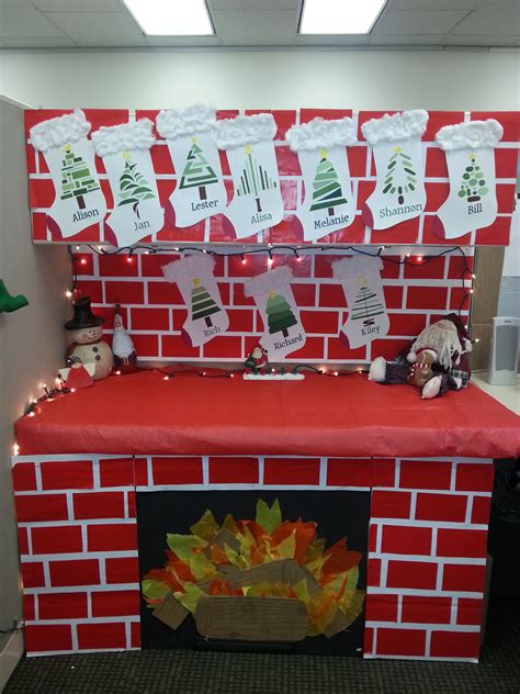 Hang a few ornaments or a small wreath from the thumbtacks on your cubicle walls. My Christmas cubicle decorations. The stockings are made from paint chips. The fireplace is a ...
