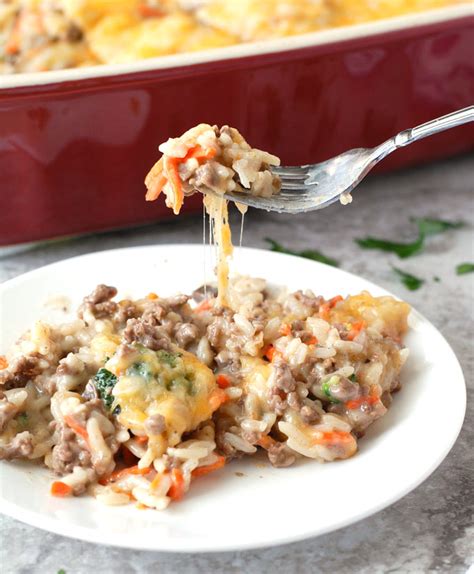 Kind of tastes like a cross between a hamburger or evenly top with remaining cheddar cheese. Cheesy Ground Beef And Rice Casserole - Food Lovin Family