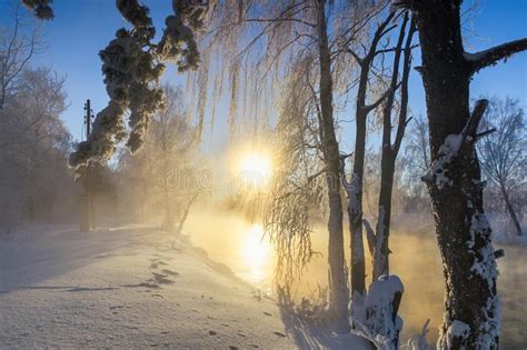 Frosty Winter Morning Landscape With Mist And Forest River Russia