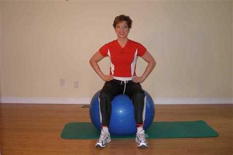 Bilateral Leg Raise On The Exercise Ball Hands On Hips
