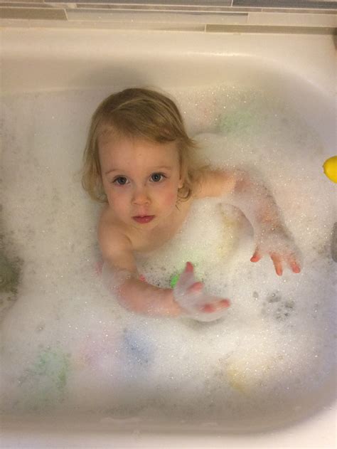 Sweet Evelyn Is Having Fun With All Of Those Bubbles Shes A Cutie