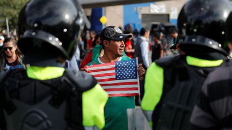 Tensions Rise As Migrants Gather At Mexico Us Border Crossing
