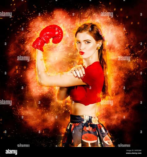 Strong Resilient And Determined Pin Up Boxing Girl Flexing Arms In A We