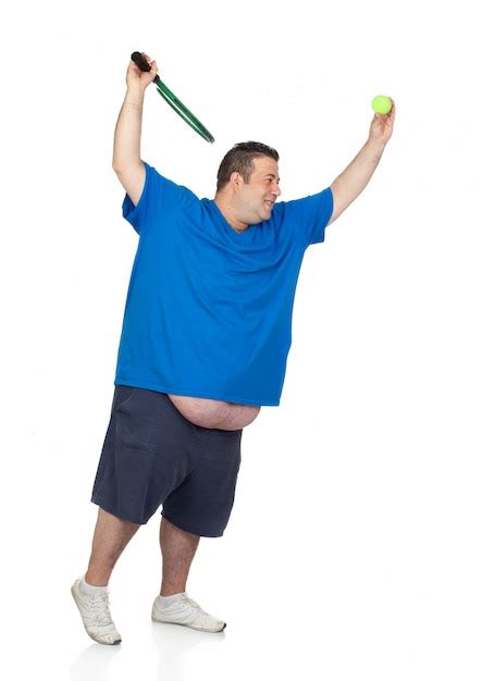 Premium Photo Fat Man With A Racket Playing Tennis Isolated On White