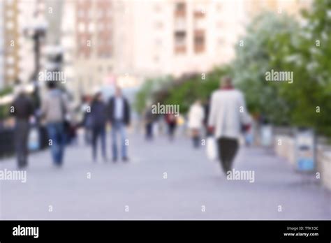 People Walking On The Street Unfocused Stock Photo Alamy