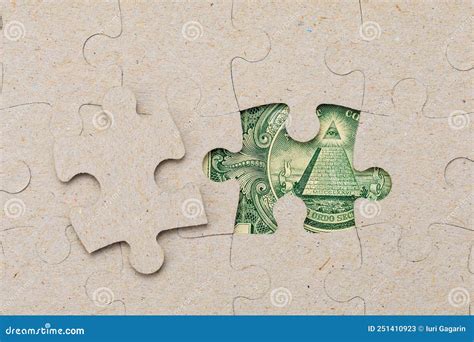 Missing Puzzle Piece and Framed US Dollars. Background with Copy Space