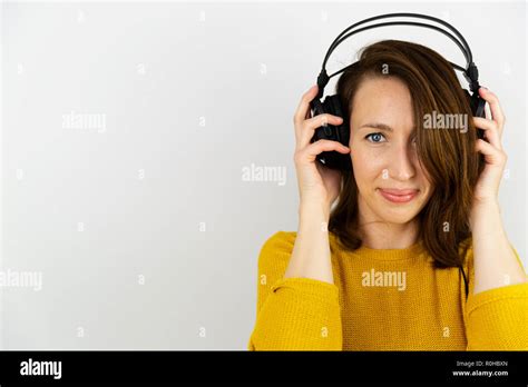 Beautiful Women Listening With Headphones On A White Background Stock