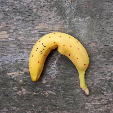 Premium Photo Banana On The Old Wooden Background The Concept Of Safe Sex Flat Lay Top View