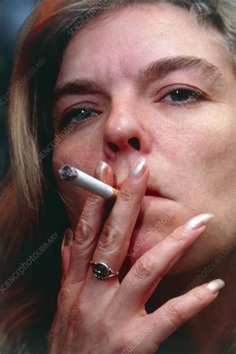 Face Of A Woman Smoking A Cigarette Stock Image M370