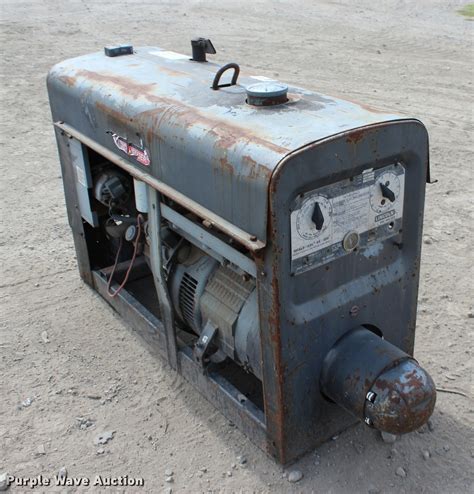 Lincoln SA-200-F-163 arc welder in Tulsa, OK | Item L3186 sold | Purple