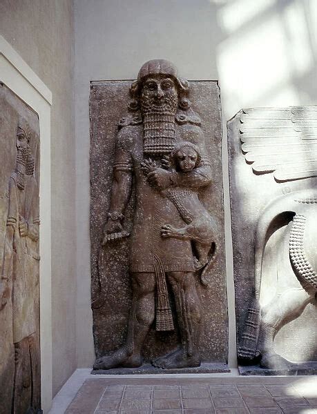 Assyrian Sculpture Of Gilgamesh Holding A Lion Khorsabad