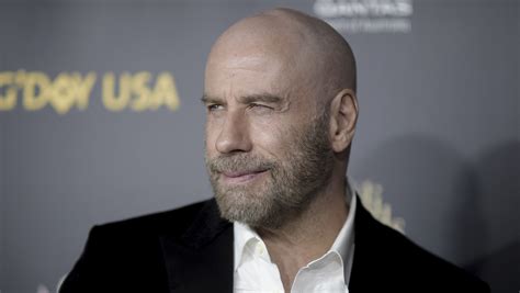 John Travolta Bald Head News Is Bigger Than Oscar Flub Credits Pitbull