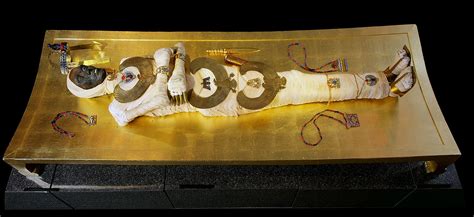 The Royal Mummy Of King Tutankhamun Wrapped In Linen Bandages