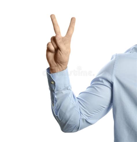 Young Man Showing Victory Gesture On Color Background Stock Image