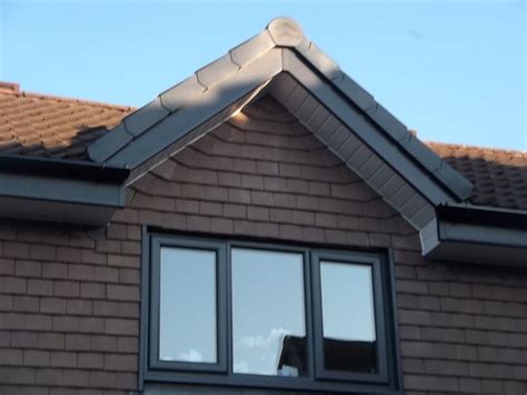 Even though the fascia, soffits and eave troughs all came from different companies the blacks all look good i would not use black soffit with green roof and brown shingles. Anthracite Grey UPVC Fascias & White Soffits | Front doors ...