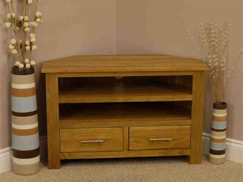 This simple open compartment storage cabinet offers four different compartments while the entire thing is made from manufactured wood and finished in an espresso. Corner Audio Cabinets - Kitchen Cabinets