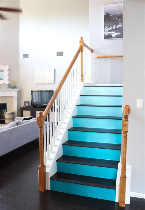 Offset the dark with light paint on the walls and warm details with picture frames and lighting fixtures. 27 Painted Staircase Ideas Which Make Your Stairs Look New