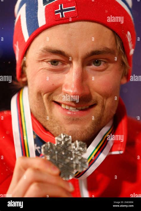 Norways Petter Jr Northug Poses With His Silver Medal After The Mens