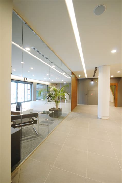 Olivari | Designer demountable, fitted wall partitions for ... By simply letting in more light, adding mirrors, and switching out light bulbs, you you have shared some very innovative office designs for the modern office interiors.