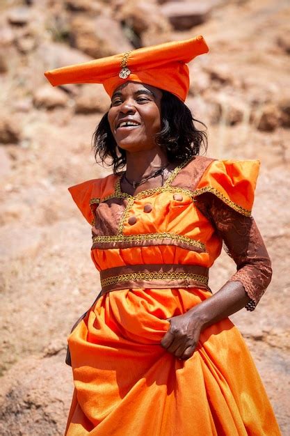 Premium Photo Portrait Of A Woman From The Guerrero Tribe In A Traditional Orange Dress