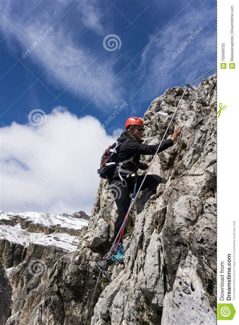 Young Female Climber On A Steep Via Ferrata In The South Tyrol Stock