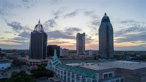 The Downtown Mobile Alabama Waterfront Skyline At Sunset Stock Photo
